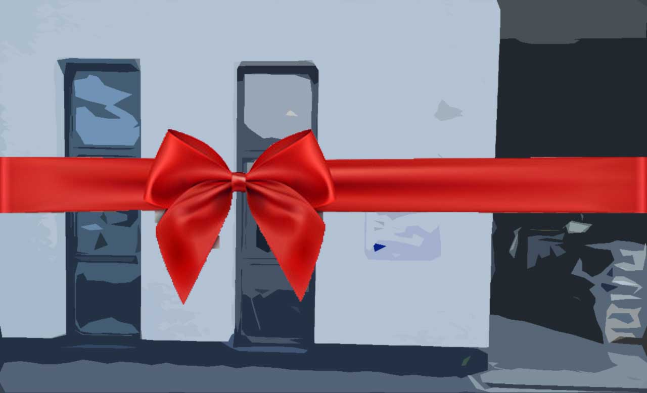 Außenfassade des Smart Grid LAB Labors mit roter Schleife auf dem Bild